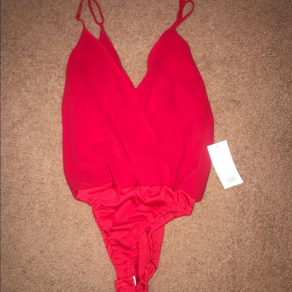 A red Tobi onesie, never worn, shear material - Picture 2 of 2